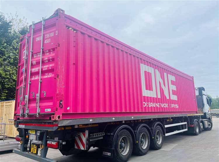 Pink container outside International Export Packers