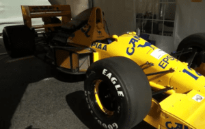 Restored Lotus 102 Formula One car in Camel livery at Great British Sports Cars workshop